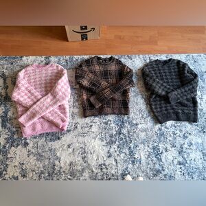 Three SKIMS Cozy Knit Sweaters
